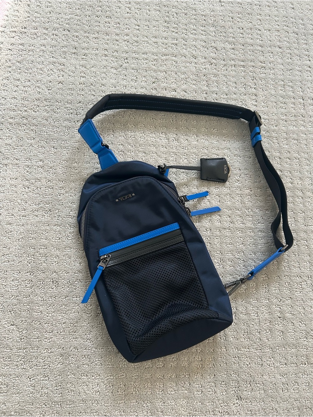 Tumi Navy Crossbody Voyageur Anna Nylon Sling Bag with Bright Blue Accents